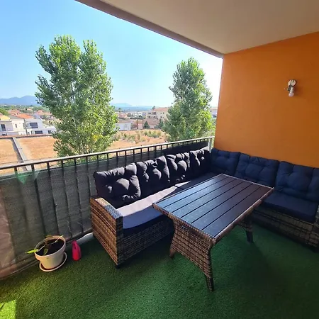 à Apartamento *